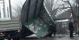 В Мариуполе лихач на мусоровозе поднял на дыбы остановку и "помял" забор (фото)